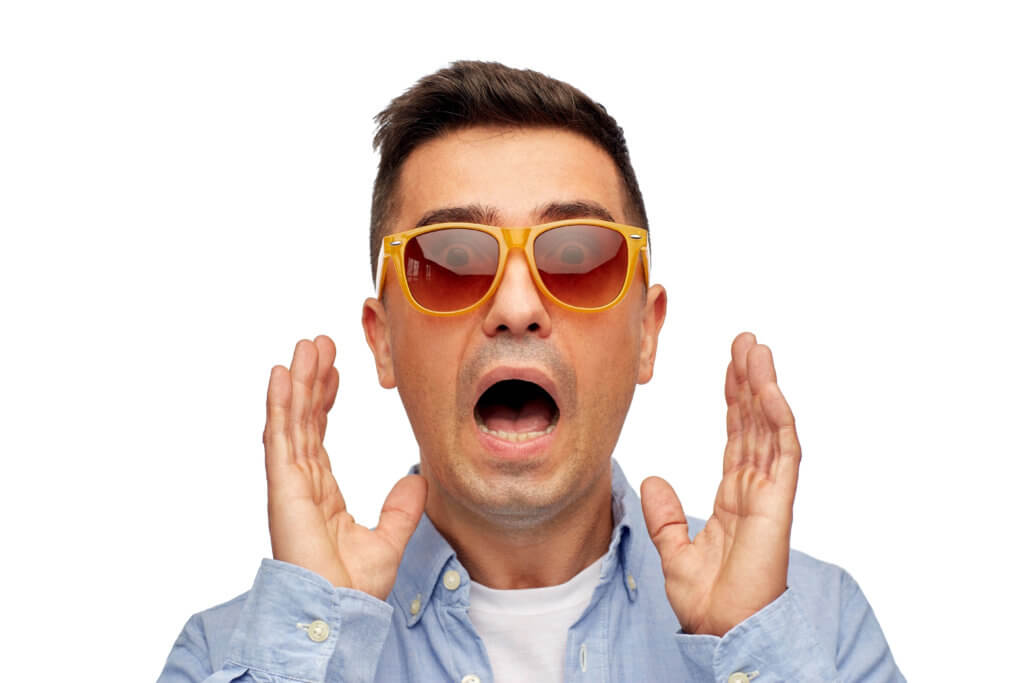 summer, emotions, style and people concept - face of scared middle aged latin man in shirt and sunglasses